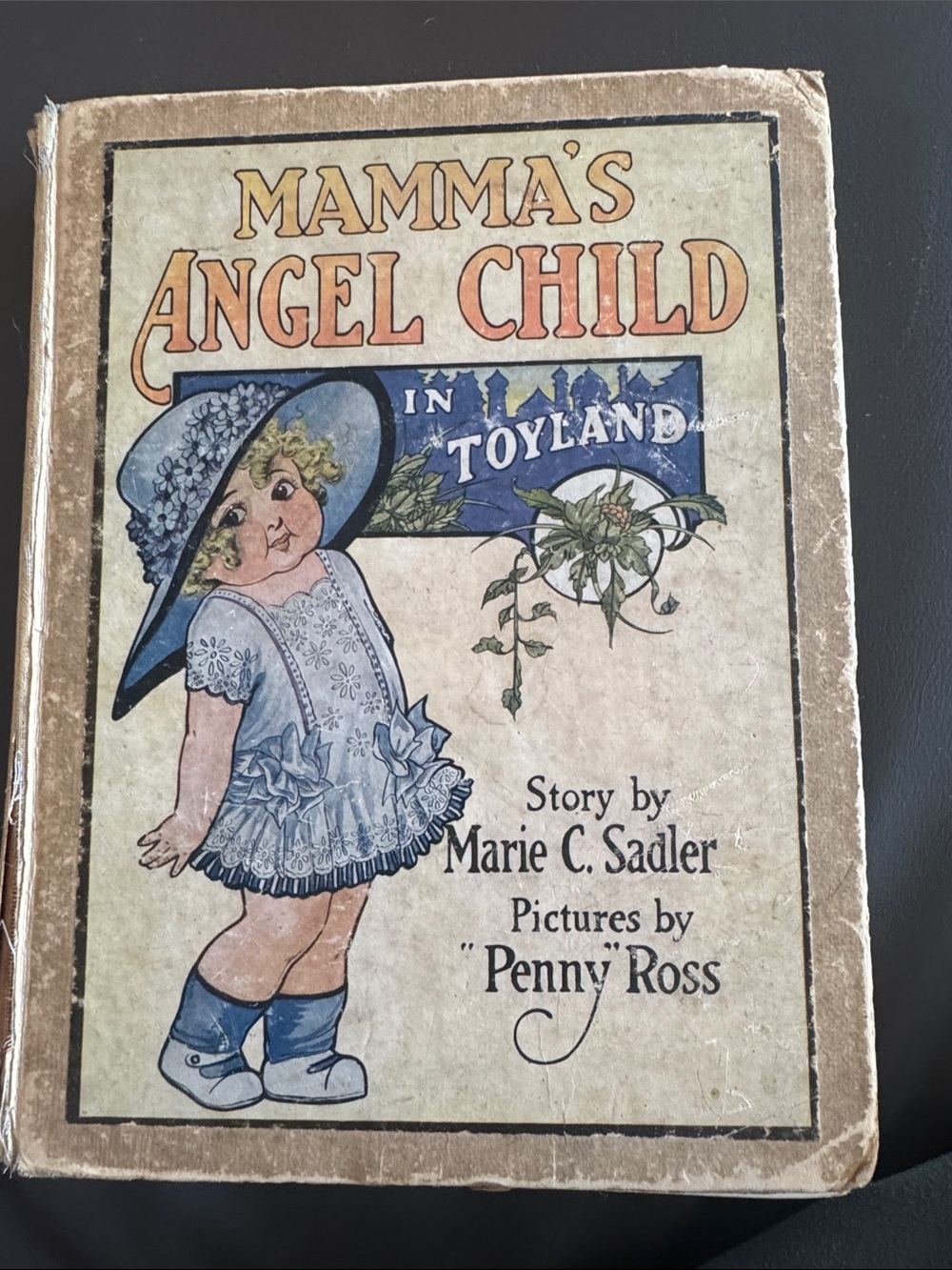 Mamma’s Angel Child In Toyland.Story by Marie C. Sadler.Pictures by Penny Ross.